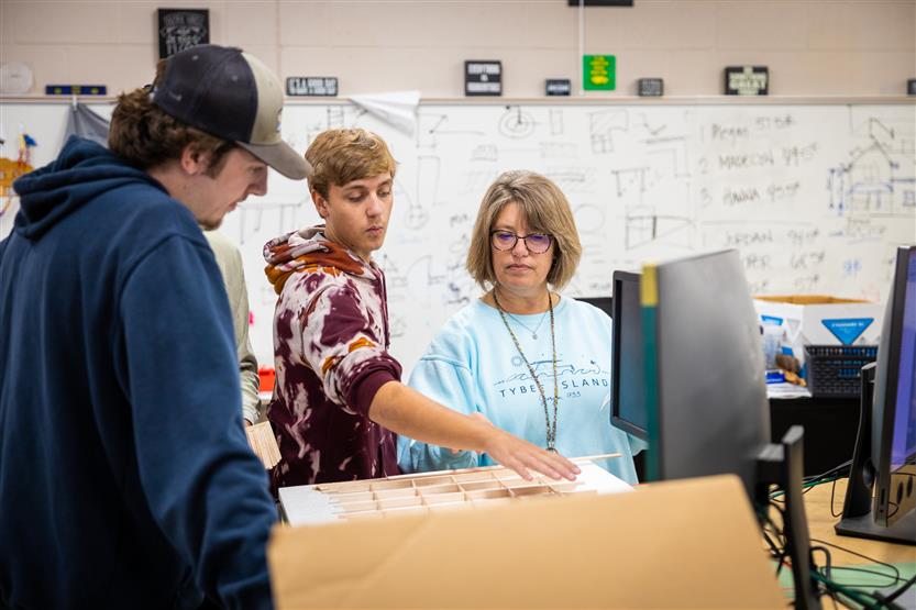 Students work in an architecture and design class